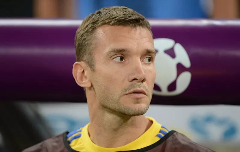 Ukrainian forward Andriy Shevchenko is seen on the bench during the Euro 2012 football championships match England vs Ukraine on June 19, 2012 at the Donbass Arena in Donetsk.  AFP PHOTO / PATRICK HERTZOG / AFP / PATRICK HERTZOG