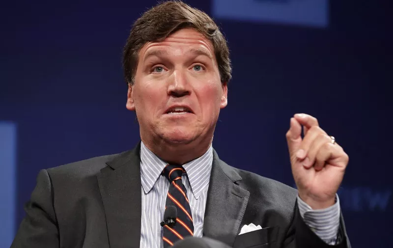 (FILES) In this file photo taken on March 29, 2019 Fox News host Tucker Carlson discusses 'Populism and the Right' during the National Review Institute's Ideas Summit at the Mandarin Oriental Hotel in Washington, DC. - Fox News star host Tucker Carlson is leaving the influential TV network, it was announced April 24, 2023, in a shock move days after the conservative outlet reached a $787.5 million settlement over a damaging defamation case. (Photo by CHIP SOMODEVILLA / GETTY IMAGES NORTH AMERICA / AFP)