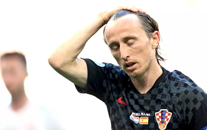 Croatia's midfielder Luka Modric reacts during the UEFA EURO 2020 round of 16 football match between Croatia and Spain at the Parken Stadium in Copenhagen on June 28, 2021. (Photo by STUART FRANKLIN / POOL / AFP)