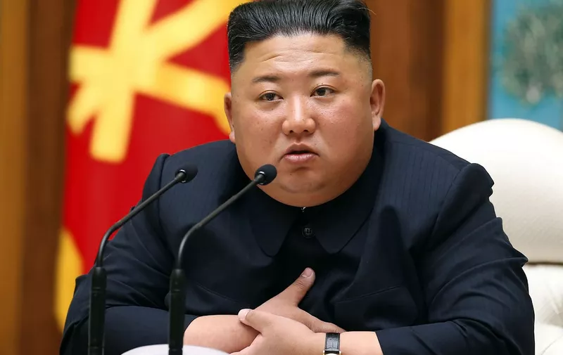 (FILES) This file picture taken on April 11, 2020 and released from North Korea's official Korean Central News Agency (KCNA) on April 12, 2020 shows North Korean leader Kim Jong Un speaks during a meeting of the Political Bureau of the Central Committee of the Workers' Party of Korea (WPK) in Pyongyang. - North Korean leader Kim Jong Un apologised on September 25, 2020 over the killing of a South Korean at sea, calling it an "unexpected and disgraceful event", Seoul's presidential office said. (Photo by STR / KCNA VIA KNS / AFP) / South Korea OUT / ---EDITORS NOTE--- RESTRICTED TO EDITORIAL USE - MANDATORY CREDIT "AFP PHOTO/KCNA VIA KNS" - NO MARKETING NO ADVERTISING CAMPAIGNS - DISTRIBUTED AS A SERVICE TO CLIENTS / THIS PICTURE WAS MADE AVAILABLE BY A THIRD PARTY. AFP CAN NOT INDEPENDENTLY VERIFY THE AUTHENTICITY, LOCATION, DATE AND CONTENT OF THIS IMAGE --- /
