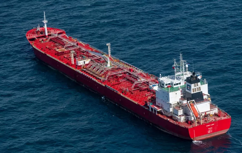 An aerial view shows the Sunny Liger, a Marshall Islands-flagged tanker with a consignment of Russian diesel, anchored in the North Sea, near IJmuiden, on April 30, 2022. - Dutch dock workers on April 30 refused to unload the tanker carrying Russian fuel in Amsterdam, a day after a similar action kept the ship from entering Rotterdam. The Sunny Liger, a 42,000-tonne tanker was currently lying at anchor off Amsterdam, while port companies were mulling her entry into the Dutch capital. (Photo by Paul Martens / ANP / AFP) / Netherlands OUT