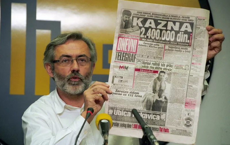 (FILES) This picture taken on November 1998 shows the editor and owner of the daily newspaper "Dnevni Telegraf" Slavko Curuvija at a press conference in Belgrade. A Serbian appeals court freed four former intelligence officers convicted of the brutal 1999 murder of journalist Slavko Curuvija, a fierce critic of late strongman Slobodan Milosevic on February 2, 2024. The ruling overturned the group's previous convictions in 2021, which saw the group handed multi-decade prison sentences. "The Court of Appeals -- in the absence of direct and indirect evidence that would reliably confirm that the defendants Markovic, Radonjic, Kurak and Romic, the perpetrators of this criminal act -- finds that the allegations of the accusation have not been proven beyond a doubt," read a statement by the court. (Photo by Andrej ISAKOVIC / AFP)