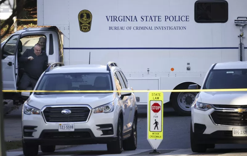 CHARLOTTESVILLE, VIRGINIA - NOVEMBER 14: A Virginia State Police criminal investigation truck is shown at the crime scene where 3 people were killed and 2 others wounded on the grounds of the University of Virginia on November 14, 2022 in Charlottesville, Virginia. The suspect is believed to be a student at the university and is still at large as the campus remains in a shelter in place lockdown.   Win McNamee/Getty Images/AFP (Photo by WIN MCNAMEE / GETTY IMAGES NORTH AMERICA / Getty Images via AFP)