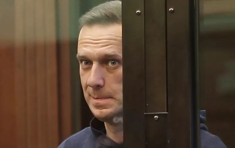 MOSCOW, RUSSIA — FEBRUARY 2, 2021: Opposition activist Alexei Navalny appears at Moscow City Court for a Simonovsky District Court hearing into an application by the Russian Federal Penitentiary Service to convert his suspended sentence of three and a half years into a real jail term. Navalny, who had been wanted in Russia since December 2020 for violating probation conditions in the Yves Rocher case, was detained at Sheremetyevo Airport near Moscow on his return to Russia from Germany on 17 January 2021. On 18 January, Moscow Region’s Khimki Court ruled that Navalny be put into custody until 15 February 2021. Moscow City Court Press Service/TASS
THIS IMAGE WAS PROVIDED BY A THIRD PARTY. EDITORIAL USE ONLY,Image: 588096071, License: Rights-managed, Restrictions: , Model Release: no