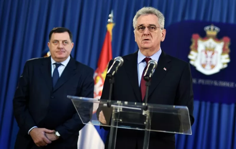 Serbian President Tomislav Nikolic (R) flanked by Bosnian Serb political leader, Milorad Dodik, addresses a press conference on February 3, 2015, in Belgrade, after the UN's highest court rejected rival claims of genocide by Croatia and Serbia.The IJC dismissed Croatia's claim that Serb forces committed genocide during the country's 1991-1995 war of independence and issued a similar ruling on a counter-claim by Belgrade over a Croatian counter-offensive that forced 200,000 Serbs to flee.  AFP PHOTO / ANDREJ ISAKOVIC