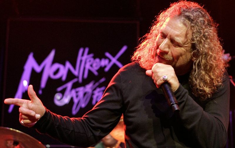 English rock singer Robert Plant, famous for being the frontman for the band Led Zeppelin performs during the opening night of the 40th Montreux Jazz festival, on late 30 June 2006 in Montreux. The night was a tribute to Ahmet Ertegun, the founder of the music label Atlantic Records. / AFP PHOTO / FABRICE COFFRINI