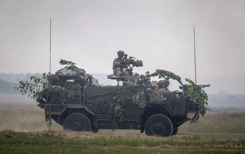 NATO troops take part in Saber Strike military exercises on June 16, 2017 in Orzysz, Poland. (Photo by AFP)