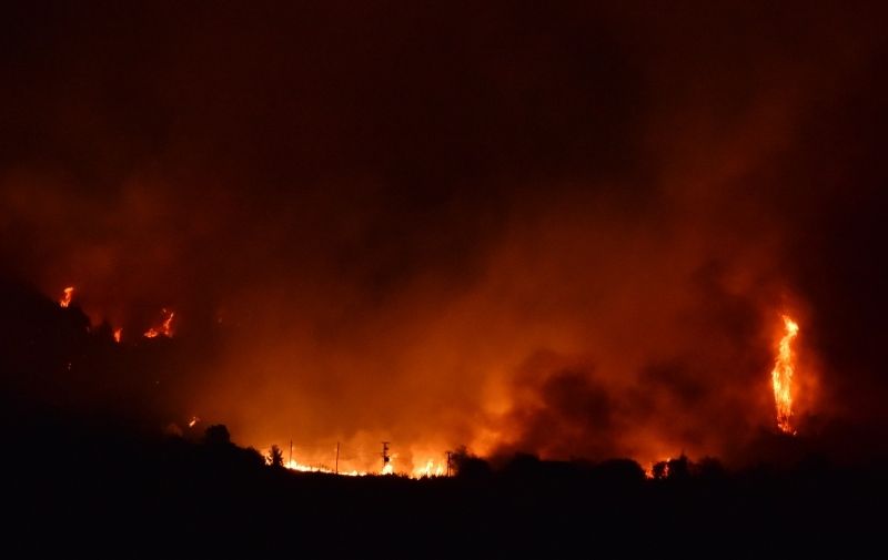 21.08.2017, Drnis
Vatrogasci i vojska borili su se tijekom noci sa vatrom na Promini kod Drnisa, dok je dio stanovistva bio evakuiran
Photo: Hrvoje Jelavic/PIXSELL