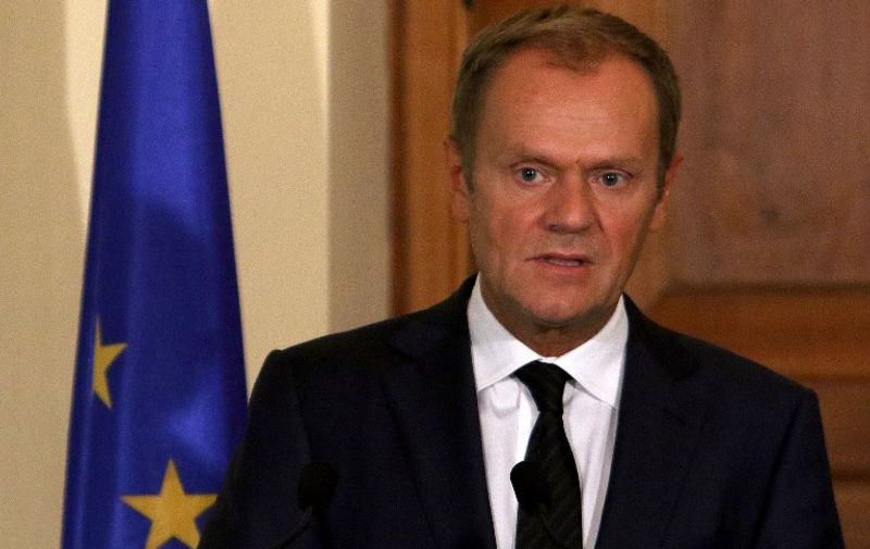 European Union leader Donald Tusk holds a press conference with Greek Cypriot leader Nicos Anastasiades at the presidential palace in the capital Nicosia on September 11, 2015. AFP PHOTO / POOL / YIANNIS KOURTOGLOU