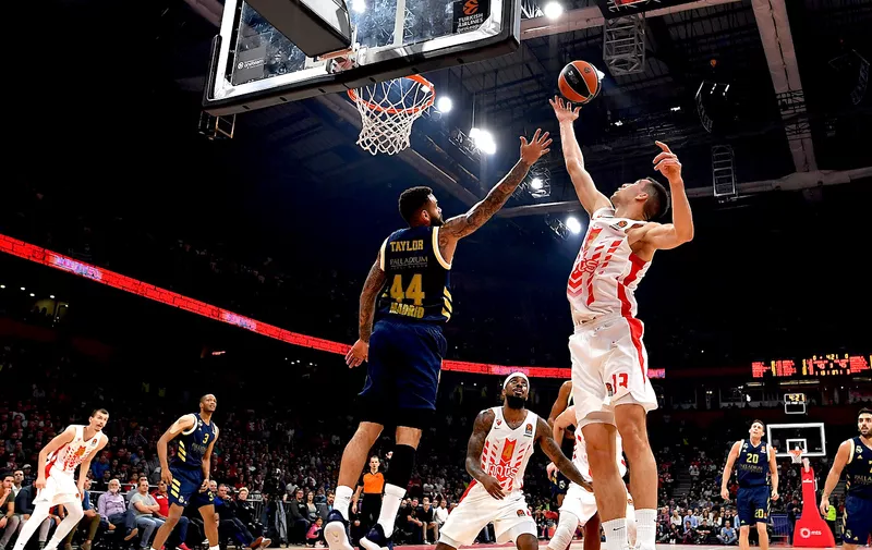 BELGRADE, SERBIA - NOVEMBER 07:  Jeffery Taylor of Real Madrid and  Ognjen Dobric of Crvena Zvezda mts Belgrade compete for the ball  during the 2019-2020 Tukish Airlines Regular Season Round 7 game between Crvena Zvezda mts Belgrade and Real Madrid at Stark Arena on November 07, 2019 in Belgrade, Serbia. (Photo by Justin Setterfield/Getty Images)