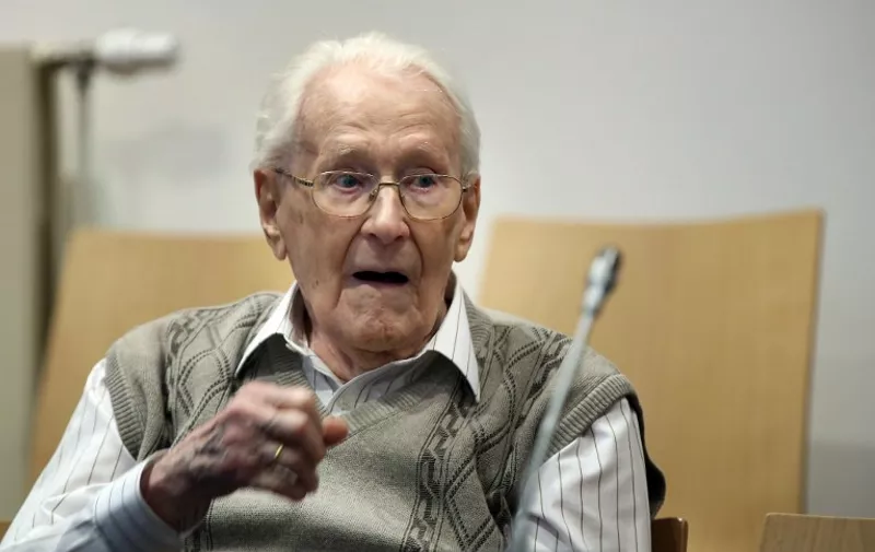 Former Nazi death camp officer Oskar Groening waits for the opening of his trial on April 21, 2015 in Lueneburg, northern Germany. The 93-year-old man dubbed the &#8220;bookkeeper of Auschwitz&#8221; is being tried on &#8220;accessory to murder&#8221; charges in 300,000 cases of deported Hungarian Jews who were sent to the gas chambers, and faces up [&hellip;]