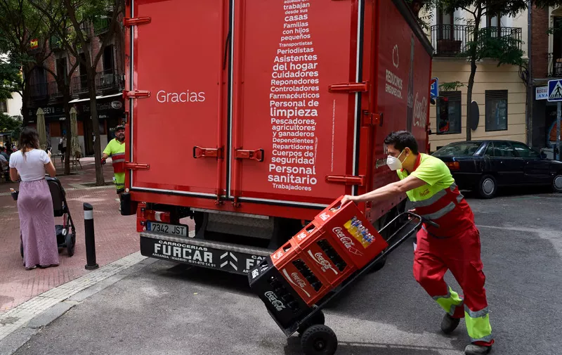 MADRID, SPAIN - JUNE 02: The words 'Thank you, journalists, healthcare personnel, caregivers, pharmacists, cleaning personnel,....' are displayed on a Coca-Cola Co. delivery truck  on June 02, 2020 in Madrid, Spain. Spain has largely ended the lockdown it imposed to curb the spread of Covid-19, which caused the death of more than 27,000 people across the country. (Photo by Carlos Alvarez/Getty Images)