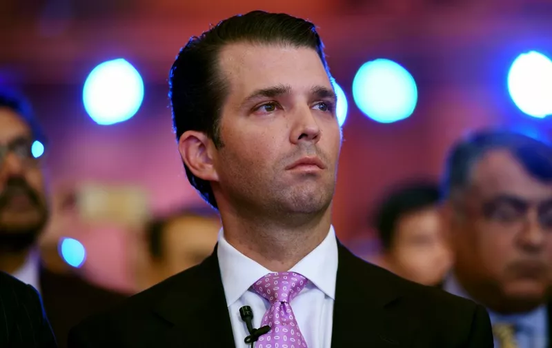 Donald Trump junior, executive vice president of The Trump Organisation, looks on during the Global Business Summit in New Delhi on February 23, 2018. - Donald Trump's presidency has cost the family firm "millions of dollars" in lost business, his son told an Indian newspaper during a visit aimed at drumming up sales of new luxury apartment complexes. (Photo by MONEY SHARMA / AFP)