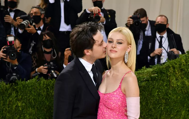 English model Brooklyn Beckham and partner US actress Nicola Peltz arrive for the 2021 Met Gala at the Metropolitan Museum of Art on September 13, 2021 in New York. - This year's Met Gala has a distinctively youthful imprint, hosted by singer Billie Eilish, actor Timothee Chalamet, poet Amanda Gorman and tennis star Naomi Osaka, none of them older than 25. The 2021 theme is "In America: A Lexicon of Fashion." (Photo by ANGELA  WEISS / AFP)