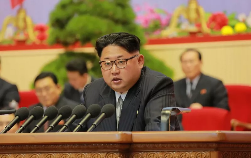 This photo taken on May 9, 2016 and released on May 10, 2016 by North Korea's official Korean Central News Agency (KCNA) shows North Korean leader Kim Jong-Un making an address to end the 7th Workers Party Congress at the April 25 Palace in Pyongyang.
North Korea kicked off a massive parade in the centre of Pyongyang on May 10 to celebrate a just-concluded ruling party congress that was seen as a formal coronation for supreme leader Kim Jong-Un. / AFP PHOTO / KCNA VIA KNS / KCNA / South Korea OUT / REPUBLIC OF KOREA OUT   ---EDITORS NOTE--- RESTRICTED TO EDITORIAL USE - MANDATORY CREDIT "AFP PHOTO/KCNA VIA KNS" - NO MARKETING NO ADVERTISING CAMPAIGNS - DISTRIBUTED AS A SERVICE TO CLIENTS
THIS PICTURE WAS MADE AVAILABLE BY A THIRD PARTY. AFP CAN NOT INDEPENDENTLY VERIFY THE AUTHENTICITY, LOCATION, DATE AND CONTENT OF THIS IMAGE. THIS PHOTO IS DISTRIBUTED EXACTLY AS RECEIVED BY AFP.  /