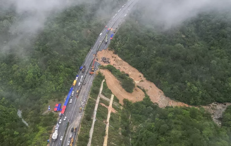 This photo taken on May 1, 2024 shows an aerial view of a collapsed section of a highway near Meizhou, in southern Chinas Guangdong province. At least 36 people died after part of a highway collapsed due to heavy rain on May 1, state media said. (Photo by CNS / CNS / AFP) / China OUT