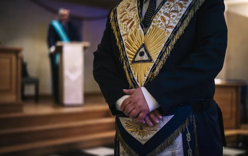 A French freemason participates in a meeting inside a masonic temple in Suresnes, west of Paris, on May 27, 2019. (Photo by Lucas Barioulet / AFP)