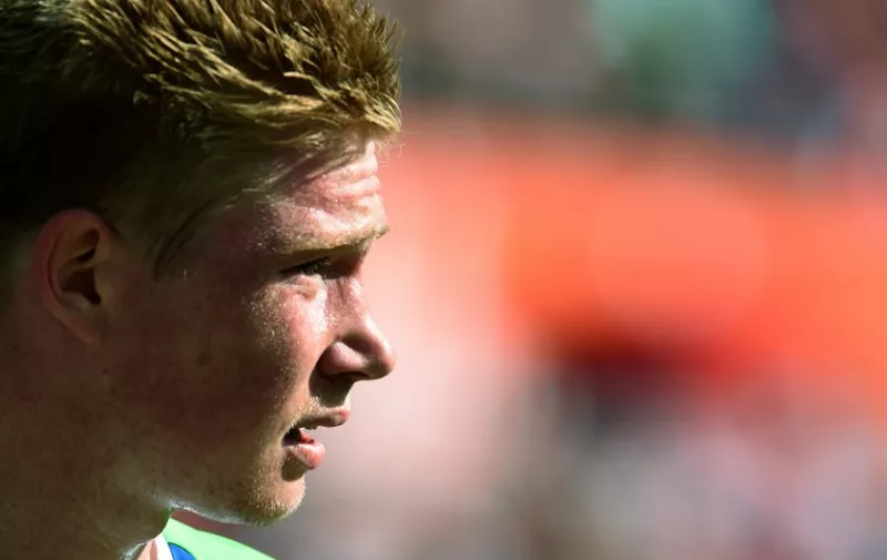 Wolfsburg's Belgian midfielder Kevin De Bruyne reacts during the German first division Bundesliga football match FC Koeln v VfL Wolfsburg , on August 22, 2015 in Cologne.  The match ends 1-1.  AFP PHOTO / PATRIK STOLLARZ

RESTRICTIONS: DURING MATCH TIME: DFL RULES TO LIMIT THE ONLINE USAGE TO 15 PICTURES PER MATCH AND FORBID IMAGE SEQUENCES TO SIMULATE VIDEO. 
== RESTRICTED TO EDITORIAL USE == FOR FURTHER QUERIES PLEASE CONTACT DFL DIRECTLY AT + 49 69 650050.