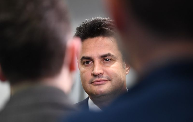 Hungarian prime ministerial candidate of the Everybody's Hungary Movement, the mayor of Hodmezovasarhely town Peter Marki-Zay, answers journalists before a press conference in Brussels on November 11, 2021. (Photo by JOHN THYS / AFP)