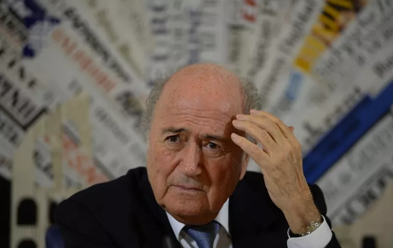 FIFA president Sepp Blatter gives a press conference on November 22, 2013 in Rome after a meeting with Pope Francis at the Vatican. Sponsors piled pressure on FIFA leader Sepp Blatter to clean up world football as two major corruption scandals overshadowed the start of a congress on May 28, 2015 which he will seek a new term. AFP PHOTO / ANDREAS SOLARO