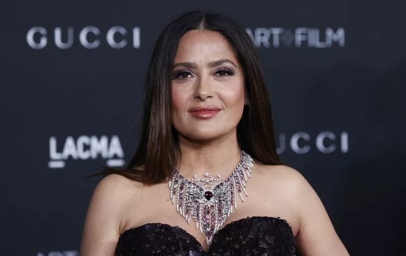 US-Mexican actress Salma Hayek arrives for the 10th annual LACMA Art+Film Gala at the Los Angeles County Museum of Art (LACMA) in Los Angeles, November 6, 2021. (Photo by Michael Tran / AFP)