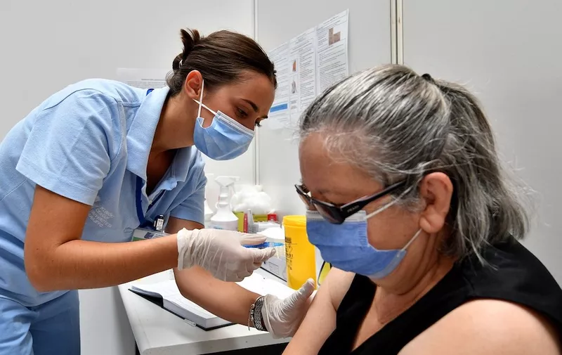 (210731) -- SARAJEVO, July 31, 2021 (Xinhua) -- A woman gets vaccinated at a COVID-19 vaccination center in Sarajevo, Bosnia and Herzegovina (BiH), July 31, 2021.,Image: 624544993, License: Rights-managed, Restrictions: , Model Release: no, Credit line: Profimedia