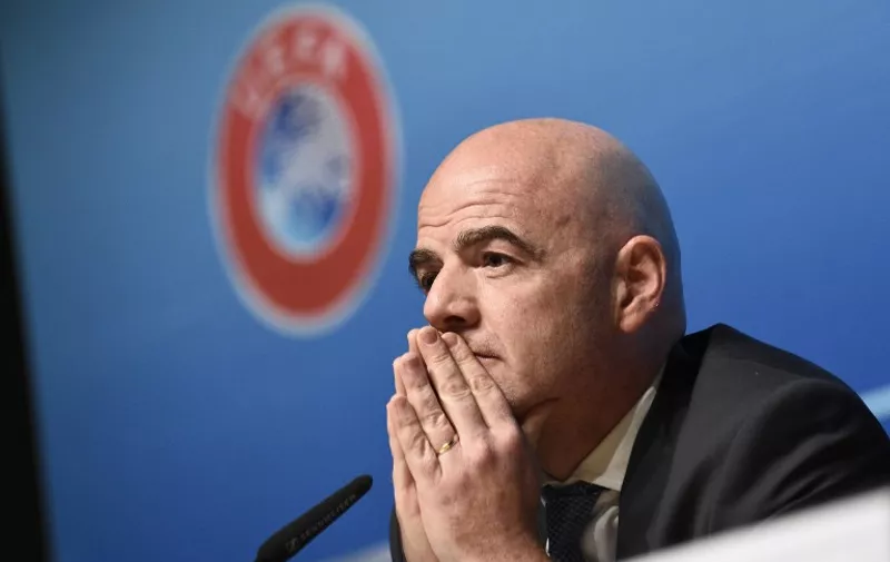 UEFA General Secretary Gianni Infantino gestures during a press conference closing an UEFA Executive meeting at the European football bodys headquarters on January 22, 2016 in Nyon. 
UEFA has approved the use of goal-line technology in its competitions, starting with the Euro 2016 tournament in France, the acting head of European football Gianni Infantino said on January 22, 2016. "We looked at it seriously...and finally we decided to start with Euro (2016) and then move on to the Champions League," Infantino told journalists following a UEFA executive meeting. / AFP PHOTO / Alain Grosclaude