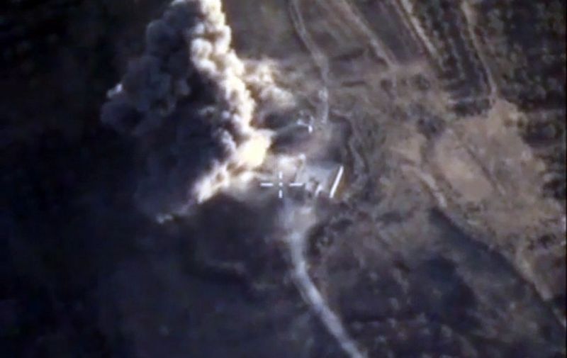 A video grab made on October 15, 2015, shows an image taken from a footage made available on the Russian Defence Ministry's official website, purporting to show an explosion after airstrikes carried out by Russian air force on what Russia says was an Islamic State foothold in the Syrian province of Idlib. AFP PHOTO / RUSSIAN DEFENCE MINISTRY 
*RESTRICTED TO EDITORIAL USE - MANDATORY CREDIT " AFP PHOTO / RUSSIAN DEFENCE MINISTRY" - NO MARKETING NO ADVERTISING CAMPAIGNS - DISTRIBUTED AS A SERVICE TO CLIENTS*