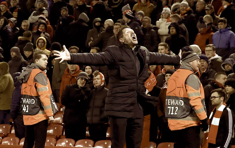 LIVERPOOL, ENGLAND - MARCH 11:  Diego Simeone, Manager of Atletico Madrid celebrates his sides second goal during the UEFA Champions League round of 16 second leg match between Liverpool FC and Atletico Madrid at Anfield on March 11, 2020 in Liverpool, United Kingdom. (Photo by Julian Finney/Getty Images)