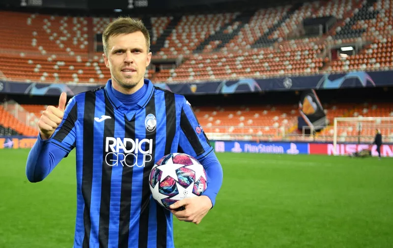 VALENCIA, SPAIN - MARCH 10: (FREE FOR EDITORIAL USE)  In this handout image provided by UEFA, Josip Ilicic of Atalanta poses with the match ball after he scores all 4 goals of the match for his team during the UEFA Champions League round of 16 second leg match between Valencia CF and Atalanta at Estadio Mestalla on March 10, 2020 in Valencia, Spain. (Photo by UEFA - Handout via Getty Images)