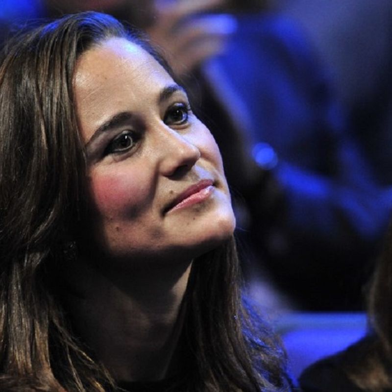 Pippa Middleton, sister of Catherine, Duchess of Cambridge, watches Jo-Wilfried Tsonga of France play against Roger Federer of Switzerland during the singles final on day eight of the ATP World Tour Finals tennis tournament in London on November 27, 2011. Roger Federer won a record sixth ATP World Tour Finals title with a 6-3, 6-7 (6/8), 6-3 victory over France's Jo-Wilfried Tsonga on Sunday. With this win he moved ahead of Pete Sampras and Ivan Lendl on the list of Tour Finals champions in the 100th final of his majestic career. The 30-year-old, who retains the title he won 12 months ago, has now won 70 trophies in his career and has also equalled Lendl's record of 39 match wins in the end-of-season event.  AFP PHOTO / GLYN KIRK / AFP PHOTO / GLYN KIRK