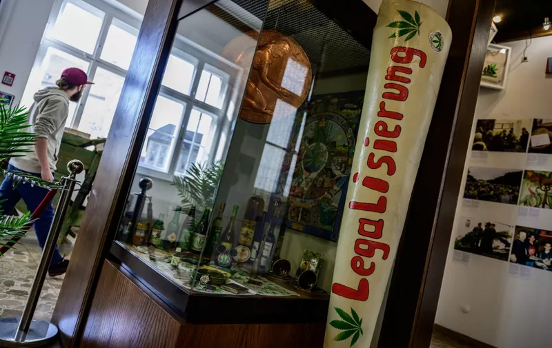 A mock up of a giant joint is inscribed with the word "Legalisation" in Berlin's Hemp Museum as the Bundestag (German lower house of parliament) is scheduled to vote on the decriminalisation of cannabis, on February 23, 2024. (Photo by John MACDOUGALL / AFP)