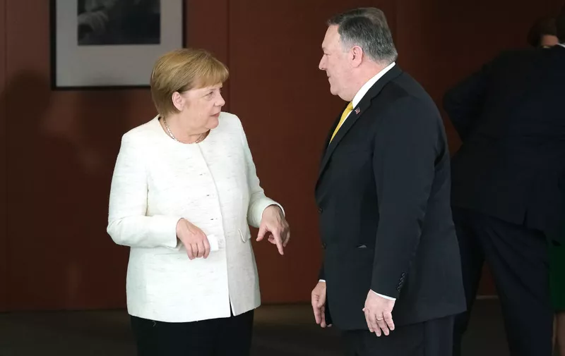 BERLIN, GERMANY - MAY 31: German Chancellor Angela Merkel and U.S. Secretary of State Mike Pompeo chat prior to giving statements to the media before talks at the Chancellery on May 31, 2019 in Berlin, Germany. Pompeo also met with German Foreign Minister Heiko Maas earlier in the day.   (Photo by Sean Gallup/Getty Images)