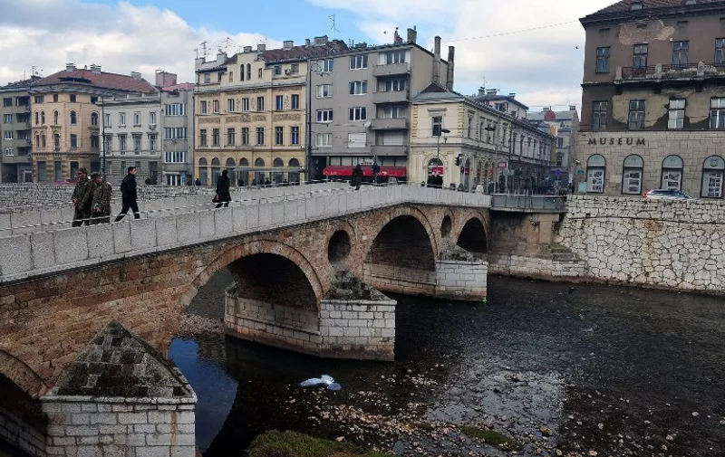 A picture taken on January 14, 2014 shows the Latin Bridge and the street corner where Serbian nationalist Gavrilo Princip assassinated Austro-Hungarian heir to the throne Archduke Franz Ferdinand and his pregnant wife Sophia on June 28, 1914. Although the underlying causes of World War I are well known -- simmering tensions between rival blocs, bound by a complex network of alliances -- the assassination in Sarajevo has long been considered as the trigger for the beginning of the 1914-18 conflict. AFP PHOTO / ELVIS BARUKCIC / AFP / ELVIS BARUKCIC