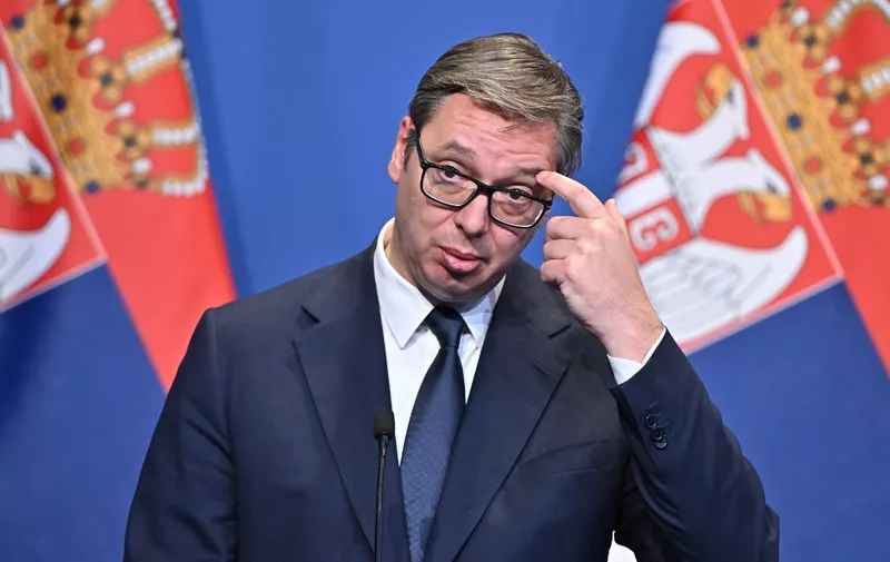 Serbian President Aleksandar Vucic attends a press conference with the Hungarian Prime Minister and the Austrian Chancellor in Budapest on October 03, 2022 after their meeting on the margins of an immigration summit. (Photo by ATTILA KISBENEDEK / AFP)