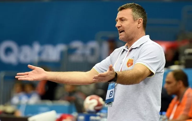 Macedonia's coach Ivica Obrvan gestures during the 24th Men's Handball World Championships preliminary round Group B  match between Macedonia  and Austria at the Ali Bin Hamad Al Attiya Arena in Doha on January 23, 2015. AFP PHOTO / FAYEZ NURELDINE / AFP / FAYEZ NURELDINE