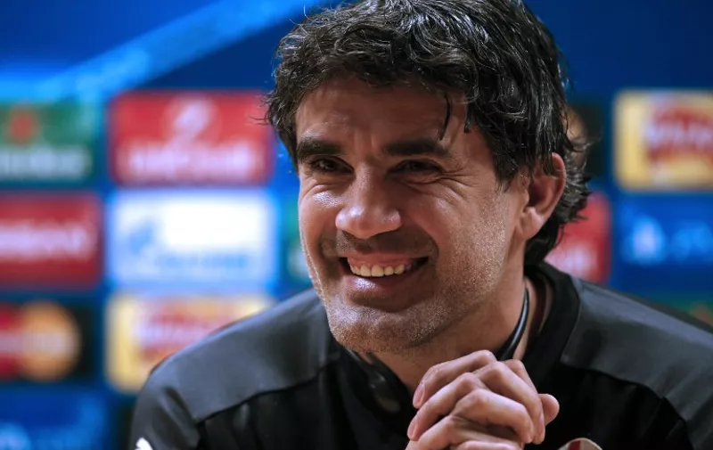 Dinamo Zagreb's Croatian coach Zoran Mamic smiles during a press conference at the Emirates stadium in north London on November 23, 2015 ahead of their UEFA Champions League Group F match against Arsenal on November 24. AFP PHOTO / ADRIAN DENNIS / AFP / ADRIAN DENNIS