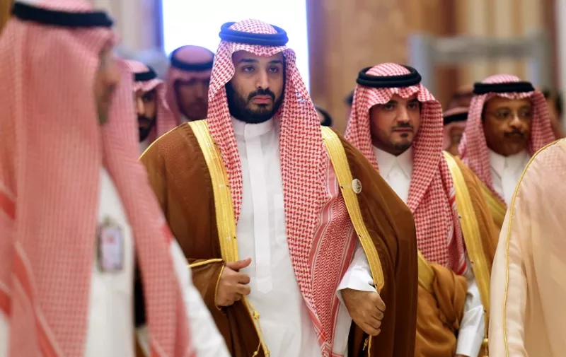 Saudi Defence Minister Mohammed bin Salman (2nd L),  who is the desert kingdom's deputy crown prince and second-in-line to the throne, arrives at the closing session of the 4th Summit of Arab States and South American countries held in the Saudi capital Riyadh, on November 11, 2015. The summit is aimed to strengthen ties between the geographically distant but economically powerful regions.  AFP PHOTO / FAYEZ NURELDINE / AFP / FAYEZ NURELDINE