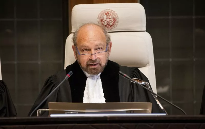 A handout picture taken and released on May 4, 2015 by the International Court of Justice (ICJ) shows ICJ President, H.E. Judge Ronny Abraham, at the opening of the hearings in the case Bolivia v. Chile (Chiles Preliminary Objection) on the access to the Pacific ocean, at the Peace Palace in The Hague. AFP PHOTO / HO / INTERNATIONAL COURT OF JUSTICE == RESTRICTED TO EDITORIAL USE - MANDATORY CREDIT "AFP PHOTO / INTERNATIONAL COURT OF JUSTICE / ICJ-CIJ / Bastiaan van Musscher" - NO MARKETING NO ADVERTISING CAMPAIGNS - DISTRIBUTED AS A SERVICE TO CLIENTS ==