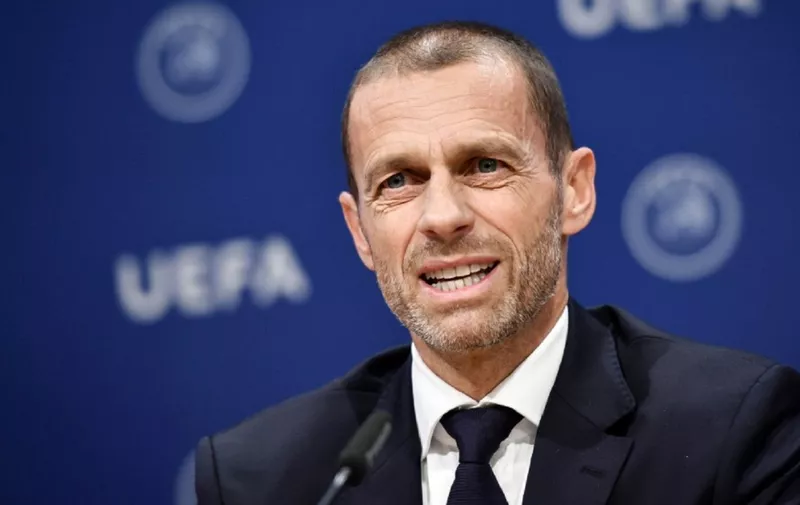UEFA president Aleksander Ceferin reacts during a press conference following a meeting of the executive committee at the UEFA headquarters, in Nyon, Switzerland on December 4, 2019. (Photo by Fabrice COFFRINI / AFP)
