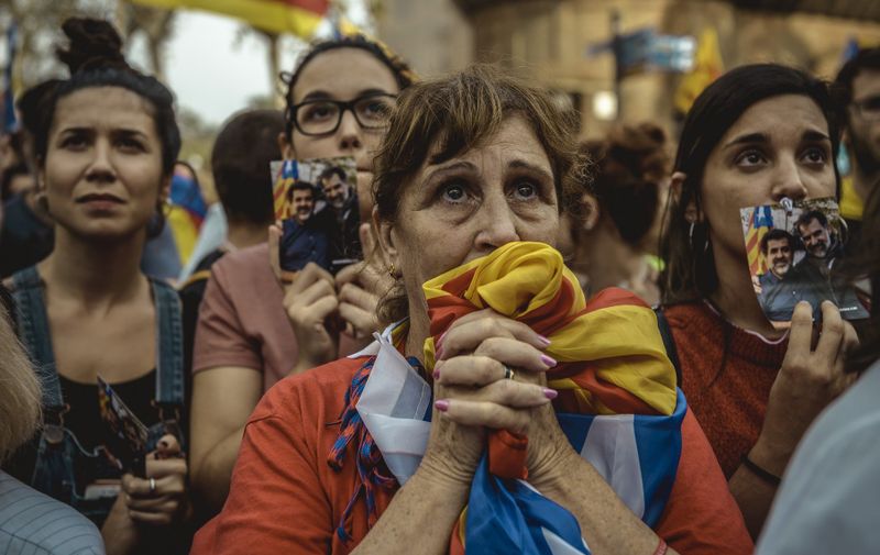 October 27, 2017 - Barcelona, Catalonia, Spain - A Catalan separatist reacts outside the Catalan Parliament as she follows on a big screen the vote for independence in the Catalan parliament, Image: 354036749, License: Rights-managed, Restrictions: , Model Release: no, Credit line: Profimedia, Zuma Press - News