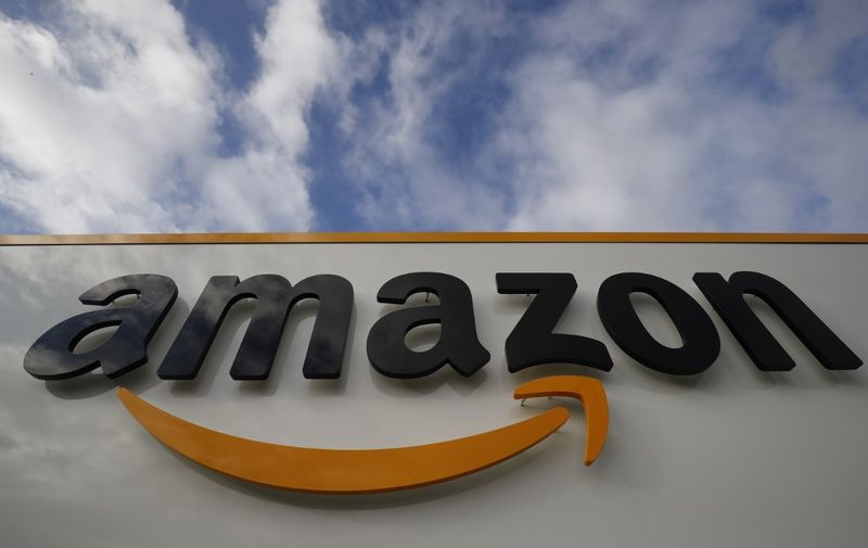 (FILES) This file photo taken on November 28, 2019 shows the Amazon logo at one of the company's centre in Bretigny-sur-Orge. - Amazon has stopped sales of some books on its platform following protests that the titles, including some for children, were Nazi-era "propaganda," a source familiar with the matter said on February 25, 2020. The move came days after the Auschwitz museum called on the US tech firm to remove Nazi-era anti-Semitic children's books from sale. (Photo by Thomas SAMSON / AFP)
