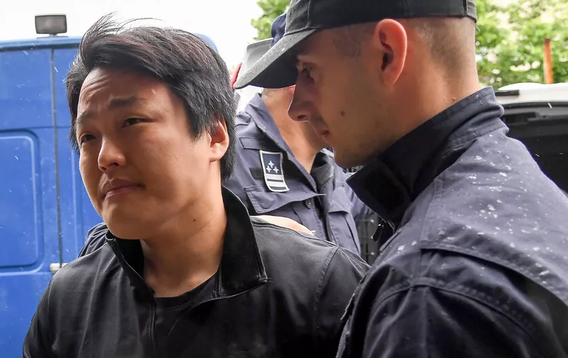 South Korean cryptocurrency entrepreneur, co-founder of Terraform Labs (Terra Luna), Do Kwon (L), is taken to court in Podgorica on May 11, 2023, following his arrest on March 24 at the Montenegrin capital's international airport. Montenegro have charged Do Kwon with forgery for attempting to travel with falsified documents at Podgorica airport. South Korean prosecutors have indicted the co-founder of Terraform Labs on multiple charges including fraud over his company's dramatic implosion last year, which wiped out about $40 billion of investors' money and shook crypto markets. The United States and South Korea have sought his extradition. 



with the South Korean expected to appear in court for extradition proceedings. Kwon, through his company Terraform Labs, is accused of orchestrating a multi-billion-dollar fraud that shook global crypto markets last year. (Photo by SAVO PRELEVIC / AFP)