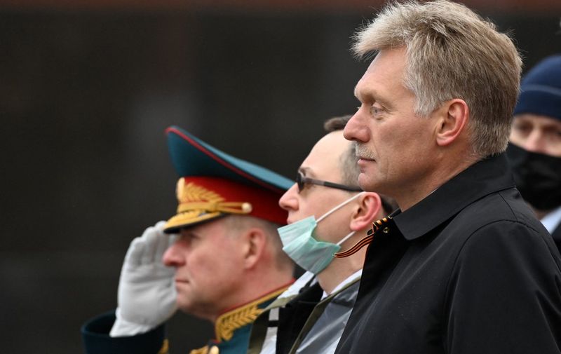 Kremlin spokesman Dmitry Peskov watches the Victory Day military parade at Red Square in Moscow on May 9, 2021. - Russia celebrates the 76th anniversary of the victory over Nazi Germany during World War II. (Photo by Kirill KUDRYAVTSEV / AFP)