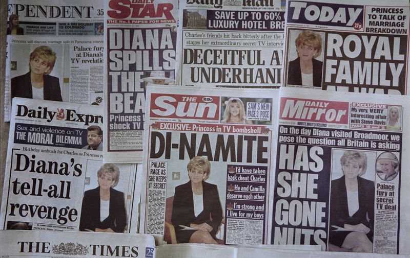 (FILES) In this file photo taken on November 15, 1995 shows front pages of UK newspapers following a television interview with BBC journalist Martin Bashir. - The BBC was under pressure on May 21, 2021 after unprecedented criticism from the royal family about its 1995 interview with princess Diana, damaging its reputation as it fights attacks on several fronts. (Photo by Johnny EGGITT / AFP)