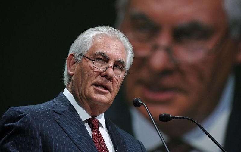(FILES) This file photo taken on June 02, 2015, shows 
Exxon Mobil Chairman and CEO Rex Tillerson addressing the World Gas Conference in Paris.
Tillerson is US President-elect Donald Trump's top pick for secretary of state, US media reported on December 10, 2016, with NBC reporting that Tillerson has already been chosen. Tillerson, 64, is an oil executive with extensive experience in international negotiations and a business relationship with Russian President Vladimir Putin. / AFP PHOTO / ERIC PIERMONT