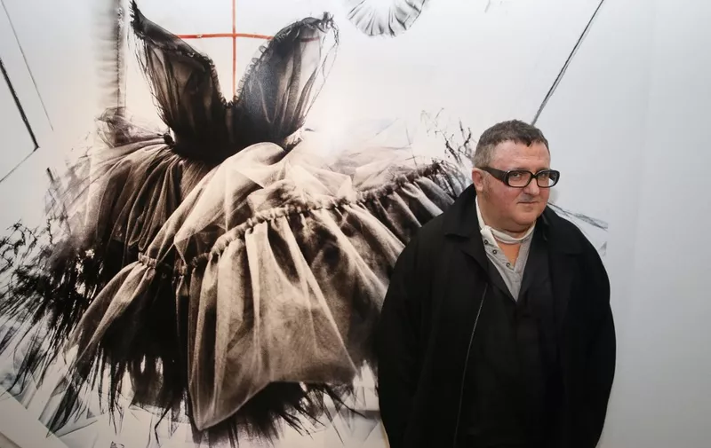 (FILES) In this file photo taken on September 08, 2015 in Paris, artistic director of the Couture house Lanvin, designer Alber Elbaz, poses during the exhibition "Manifesto" dedicated to his work. Alber Elbaz, the fashion designer whose audacious designs transformed the storied French house Lanvin into an industry darling before his shock ouster in 2015, has died aged 59, the Richemont luxury group said on April 25, 2021. (Photo by Patrick KOVARIK / AFP)