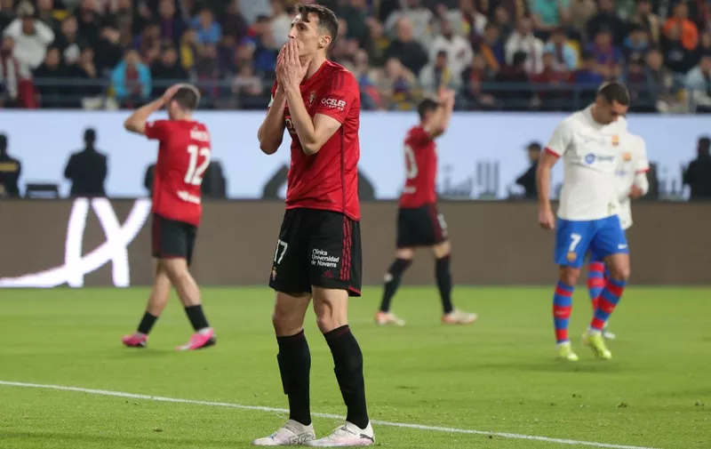 Osasuna's Croatian forward #17 Ante Budimir reacts to a missed chance during the Spanish Super Cup semi-final football match between Barcelona and Osasuna at the Al-Awwal Park Stadium in Riyadh, on January 11, 2024. (Photo by Fayez NURELDINE / AFP)