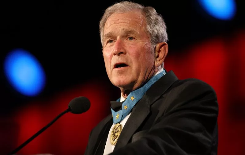 ST. PAUL, MN JULY26: George W. Bush takes the stage at the 2015 Starkey Hearing Foundation So The World May Hear Gala at the St. Paul RiverCentre on July 26, 2015 in St. Paul, Minnesota. : Adam Bettcher/Getty Images for the Starkey Hearing Foundation/AFP