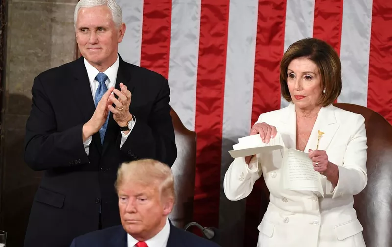 Speaker of the US House of Representatives Nancy Pelosi rips a copy of US President Donald Trumps speech after he delivered the State of the Union address at the US Capitol in Washington, DC, on February 4, 2020. (Photo by MANDEL NGAN / AFP)